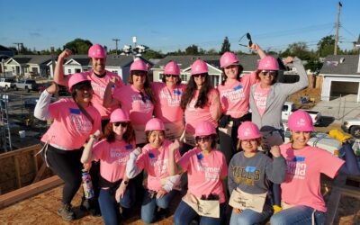 Employees Volunteer to Build and Beautify Homes