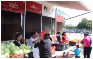 People lining up to receive food.