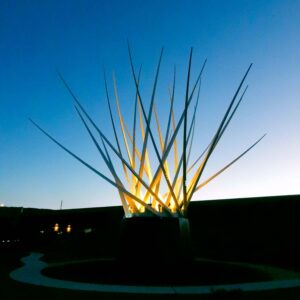 the sculpture 'reno star cosmic thistle' photographed at sunset